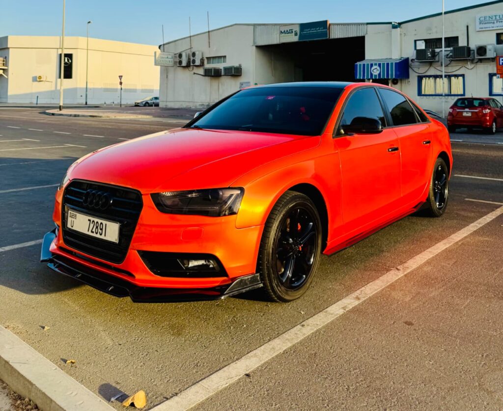 Premium car wrapping in Dubai with custom vinyl wrap installation by Carmods Dubai.